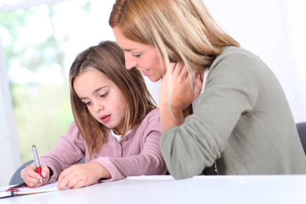 Mother Daughter Doing Homework Home Stock Image