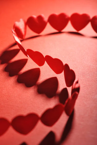 Chain Small Red Fabric Hearts Red Background — Fotografia de Stock