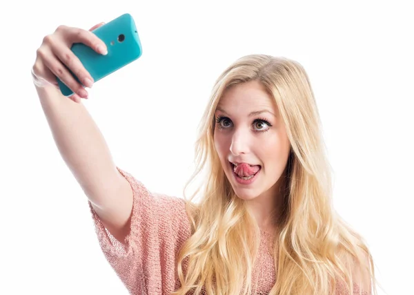 Una Chica Rubia Saca Lengua Toma Una Selfie —  Fotos de Stock