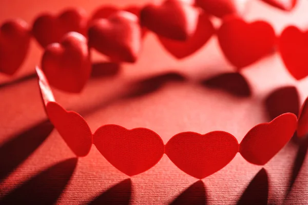 Chain Small Red Fabric Heart Red Background — Fotografia de Stock