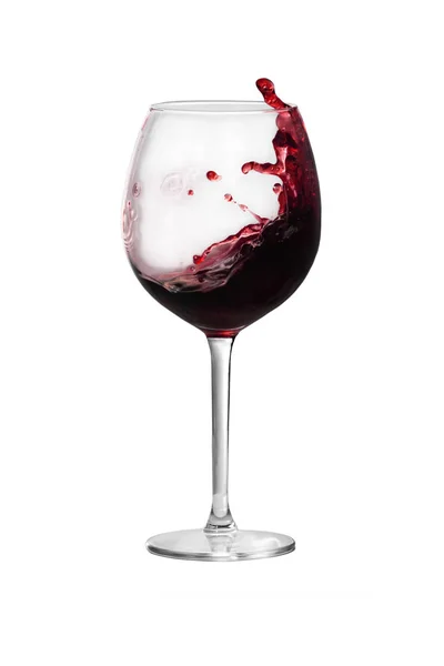 赤ワインがワイングラスから飛び出してる — ストック写真
