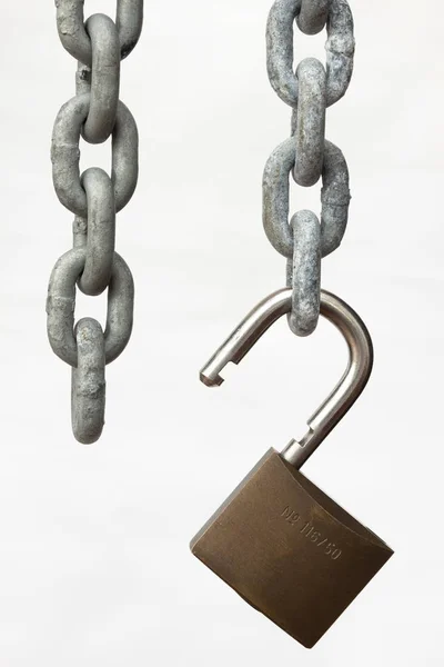 chain and padlock on the background of the old iron