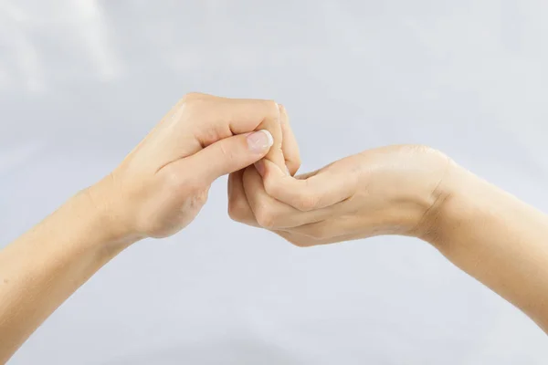 Two Young Female Hands Holding Each Other Fingertips — Stock Photo, Image