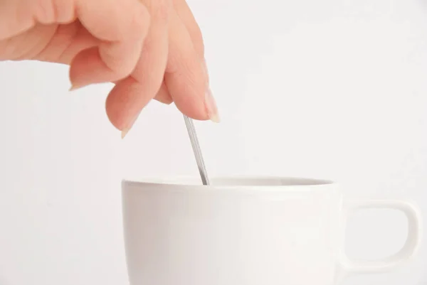 Kéz Kezében Egy Csésze Kávét Fehér Háttér — Stock Fotó