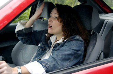 young woman gets upset when driving on their front man\r clipart