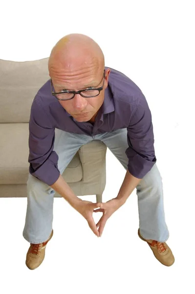 Man Bald Head Glasses Sitting Casually Sofa — Stok Foto