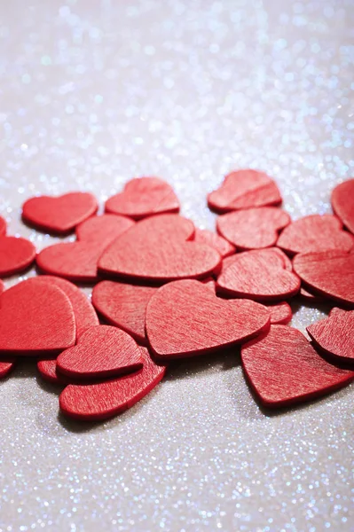 Many Small Red Wood Hearts White Glitter Background —  Fotos de Stock