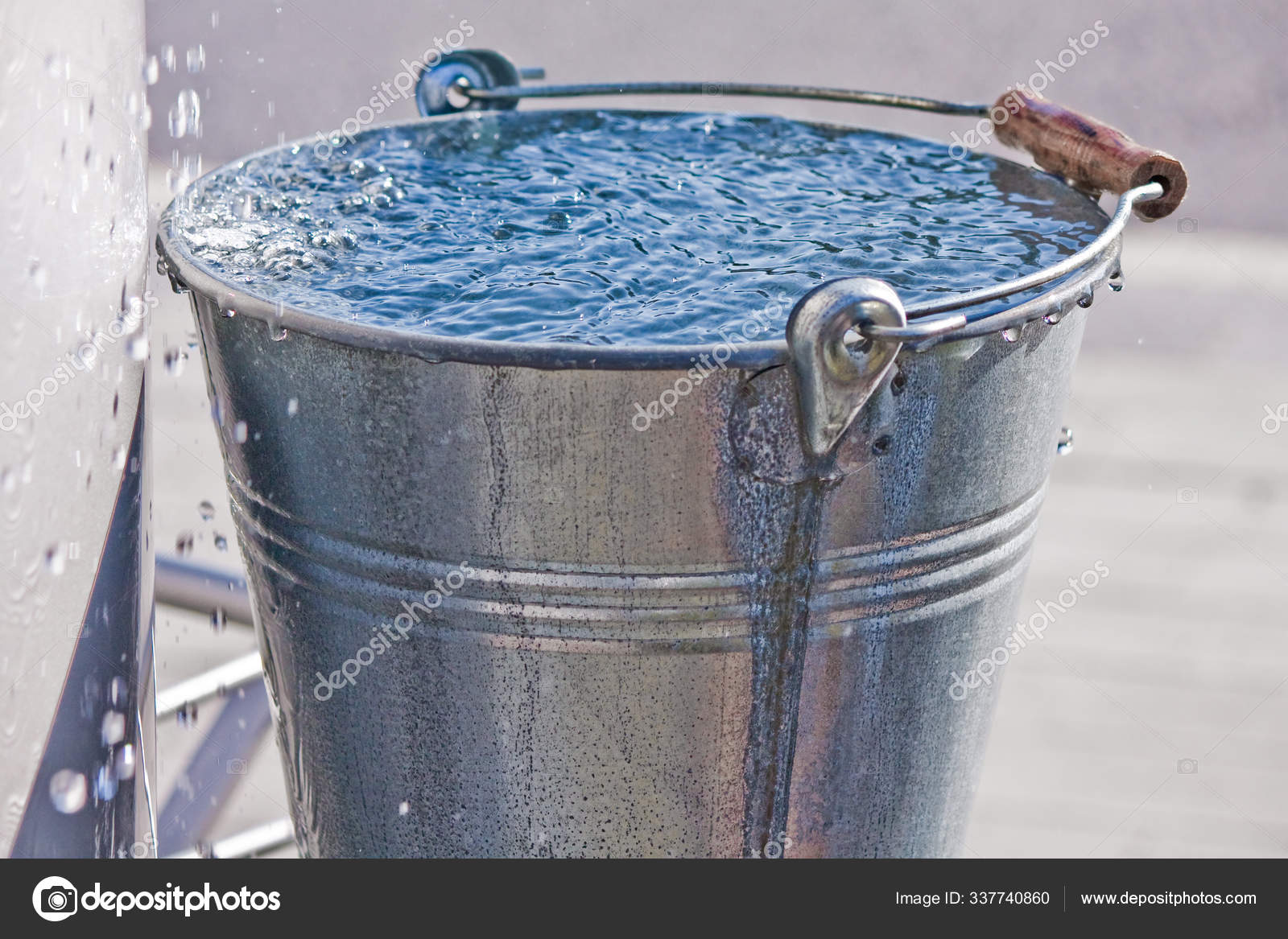 Metal Bucket Water Droplets Stock Photo by ©PantherMediaSeller 337740860