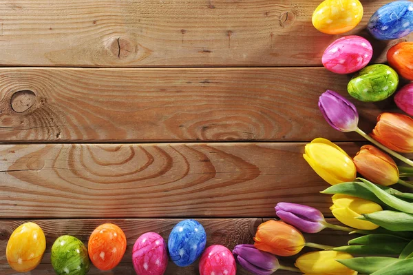 Colorful Easter Eggs Tulips Old Wooden Floor — Zdjęcie stockowe