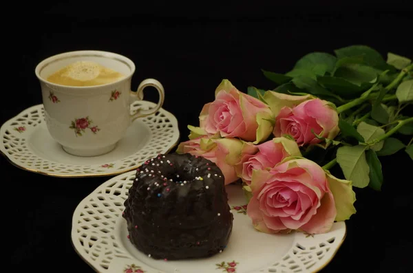 still life with coffee,roses and cake