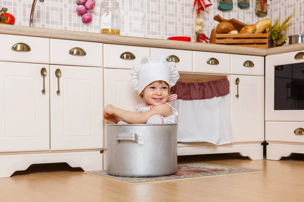 Little Girl Apron Cap Cook Sitting Kitchen House Mother Helper — Stock Photo, Image