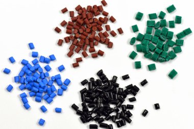 dyed polymer pellets for injection moudling process clipart