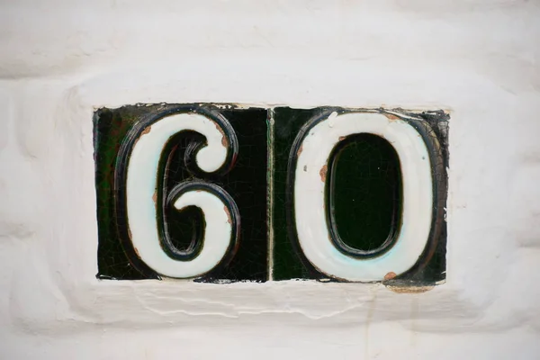 house facades,street signs,email,tiles,spain,house number 60