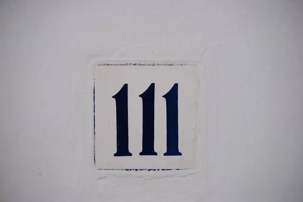 Znaki Drogowe Ziemia Kafelki Hiszpanie Numer Domu 111 — Zdjęcie stockowe