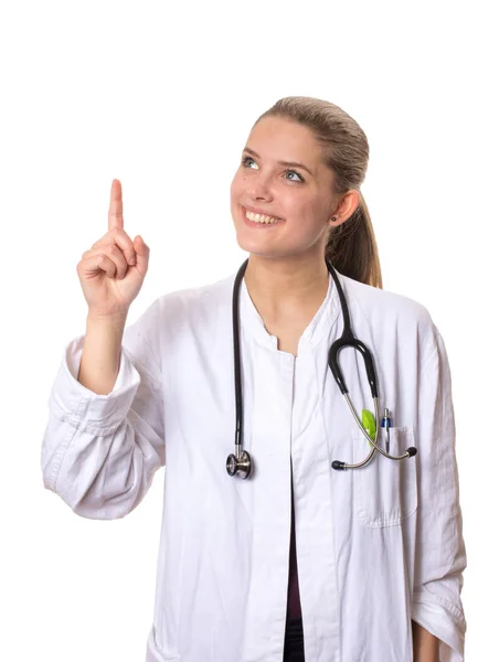 Beyaz Önlüklü Kadın Doktor Işaret Parmağıyla Yukarı Bakıyor — Stok fotoğraf