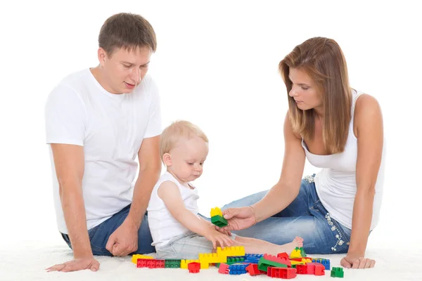 Familia Feliz Con Dulce Juego Bebé Sobre Fondo Blanco Fotos de stock libres de derechos