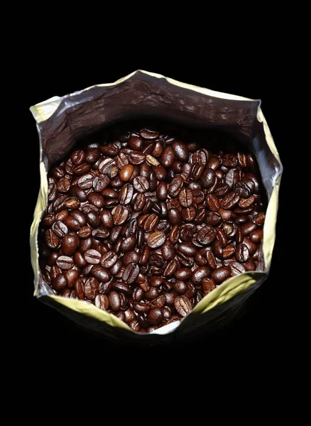 Kaffeebohnen Schwarzer Tüte Auf Weißem Hintergrund — Stockfoto