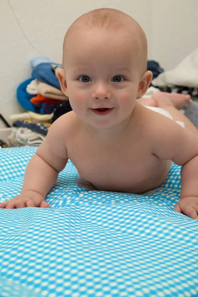 Cheerful Newborn Playing Diaper Table — Stock Photo, Image