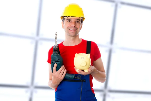 Friendly Young Worker Drill Piggy Bank — Stock Photo, Image