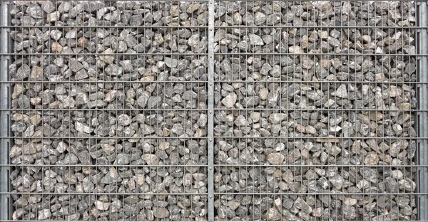 Duży Symetryczny Gabion Wypełniony Szarymi Kamieniami Naturalnymi — Zdjęcie stockowe