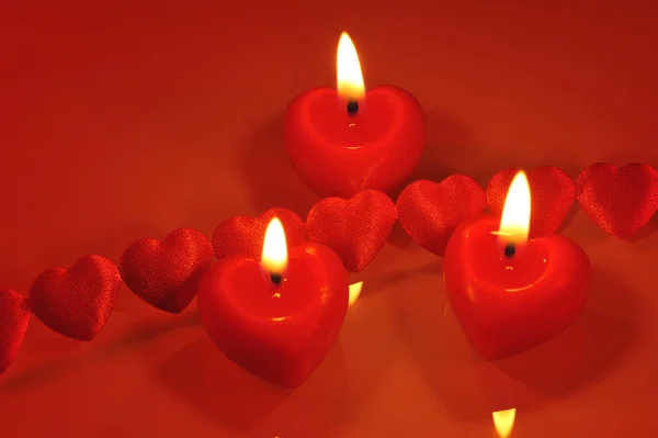 Three Bright Red Heart Shaped Candles Fabric Hearts — Stock Photo, Image