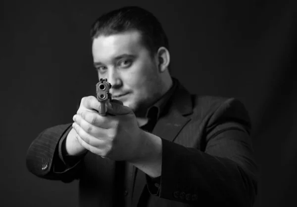 Young Man Points Gun — Stock Photo, Image