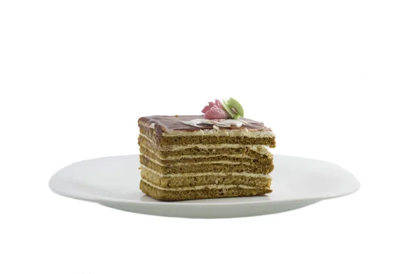 Torta Beige Piatto Bianco Sullo Sfondo Isolato — Foto Stock