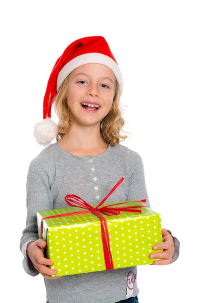 Nettes Mädchen Mit Santa Mütze Und Geschenk Stockfoto