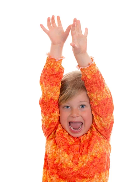 Pequena Garota Engraçada Está Jubilando Frente Fundo Branco — Fotografia de Stock