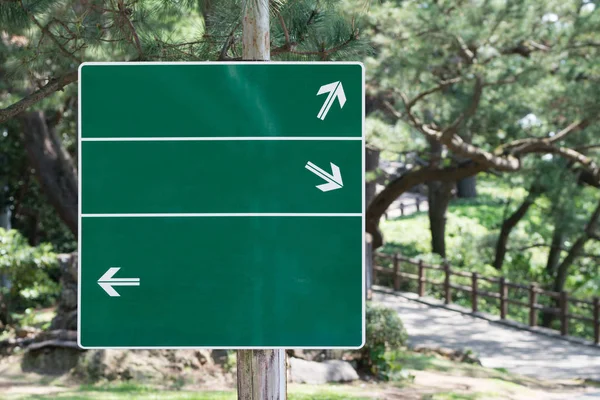 Blank Green Sign Arrows Pointing Different Directions Outdoors — Stock Photo, Image
