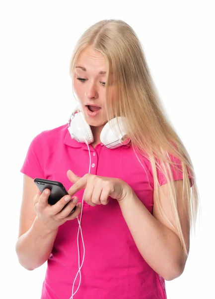 Mujer Joven Con Auriculares Selecciona Música Móvil —  Fotos de Stock
