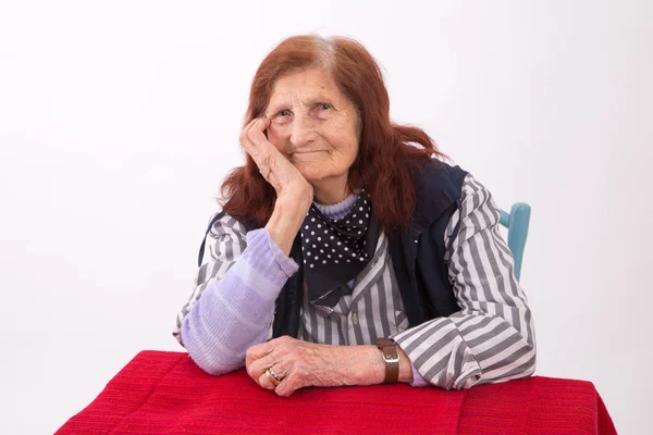 Portret Starszej Kobiety Zadawalającym Wyrazem Twarzy — Zdjęcie stockowe