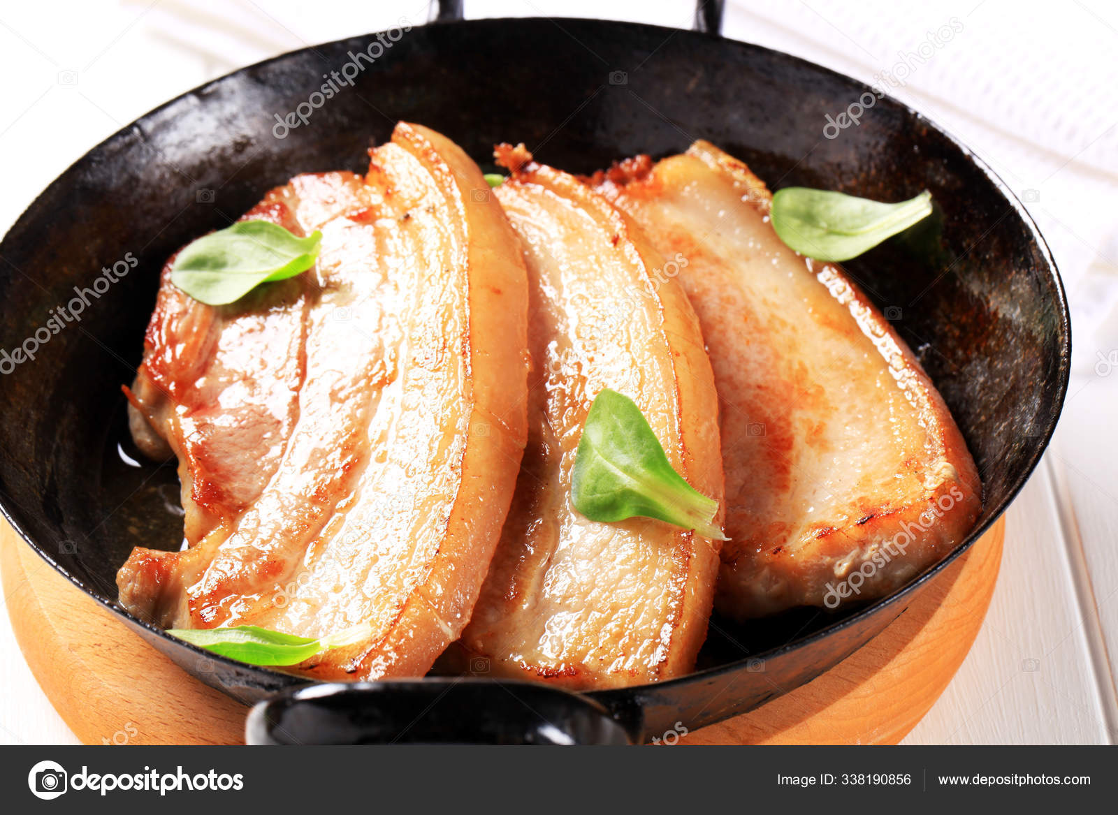 Pan Fried Pork Belly Slices Stock Photo by ©PantherMediaSeller 338190856