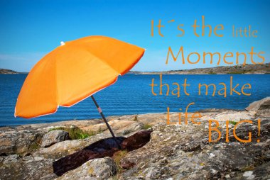 Bohuslan Archipelago Swedish West Coast With Rocks And Cliffs. Beach With Orange Parasol.English Life Quote Its The Little Moments That Make Life Big. Ocean And Open Sea Sunny Weather With Blue Sky clipart