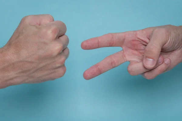 Men Hands Playing Rock Paper Scissors Light Blue Background One — Stock Photo, Image