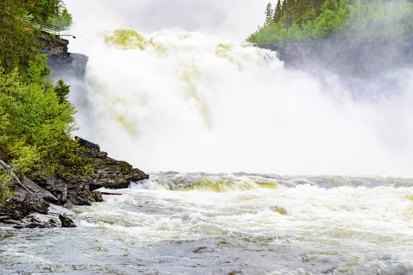 stock image Tannforsen is Swedens greatest waterfall with a total fall of 38m and width of 60m. Here seen in summertime.