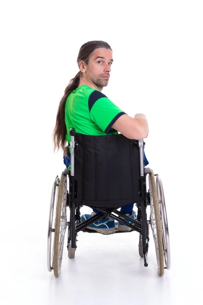 Junger Mann Rollstuhl Vor Weißem Hintergrund Von Hinten — Stockfoto