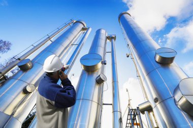 oil and gas worker with giant pipes, pipelines clipart