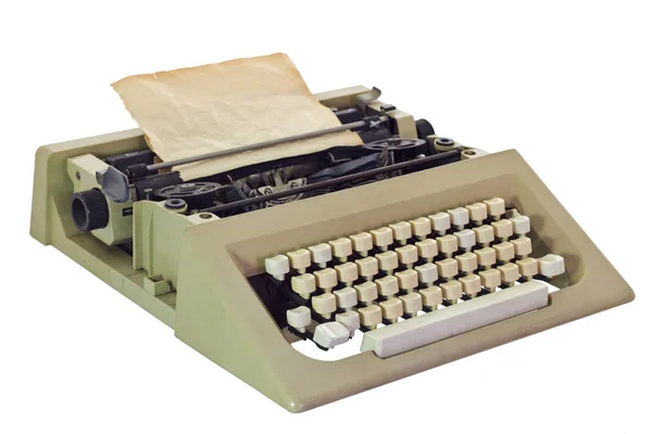 白の背景に隔離された紙のシートを持つ古いタイプライター — ストック写真