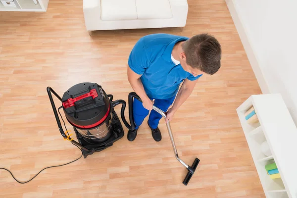 High Angle View Male Janitor Cleaning Floor Vacuum Cleaner — Stock Photo, Image