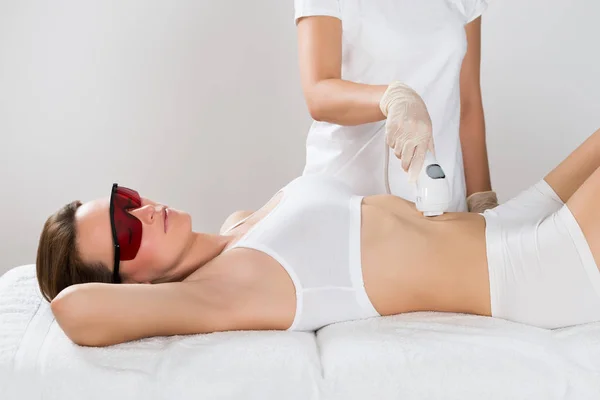 Young Woman Lying Bed Receiving Epilation Laser Treatment Tummy — Stock Photo, Image