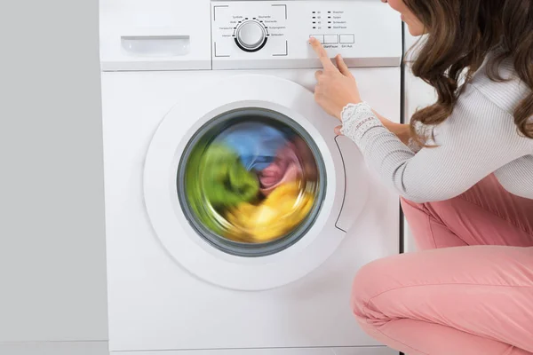 Close Young Woman Pressing Button Washing Machine Kitchen — Stok Foto