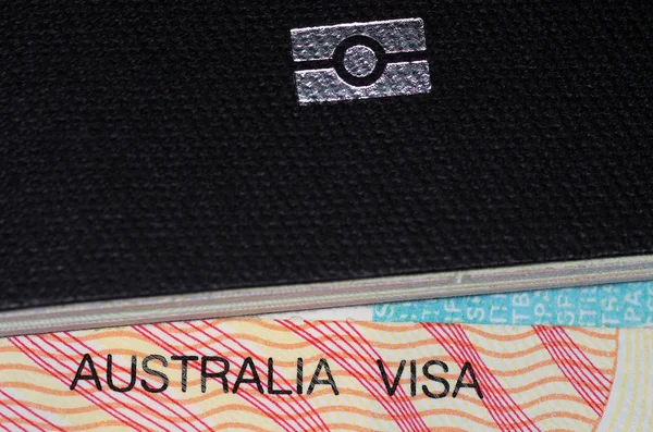 close up view of a australian immigration visa and australian passport