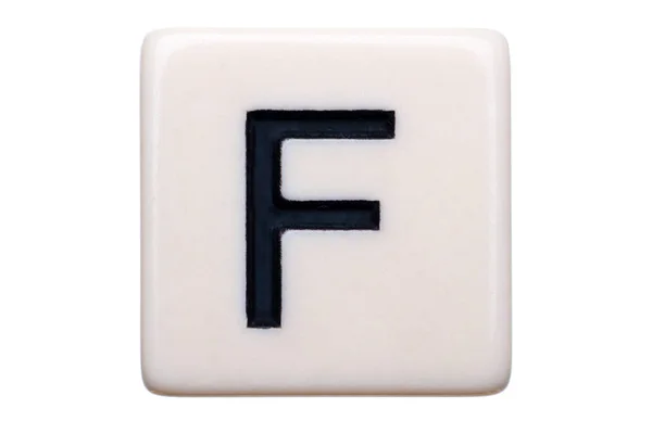 游戏磁贴的宏拍摄 白色背景上带有字母 — 图库照片
