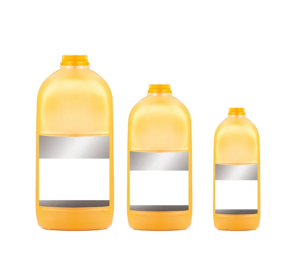 Trzy Butelki Soku Pomarańczowego Izolowane Białym Tle — Zdjęcie stockowe