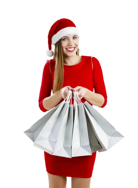 Mooie Aantrekkelijke Vrouw Met Een Kerstmuts Houden Shopping Tassen — Stockfoto