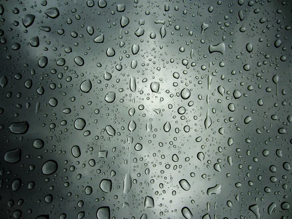 Regenwasser Auf Spiegelglashintergrund — Stockfoto