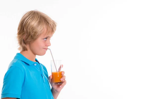 stock image blond boy in blue dress drinking fruit juice