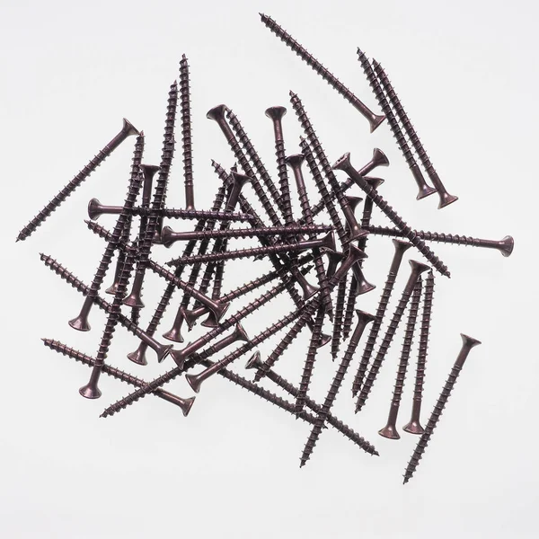 Many Bronze Screws Wood — Stock Photo, Image