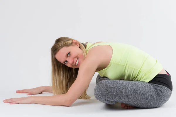 Blond Woman Doing Yoga Stretching Exercises Isolated White — Stock Photo, Image